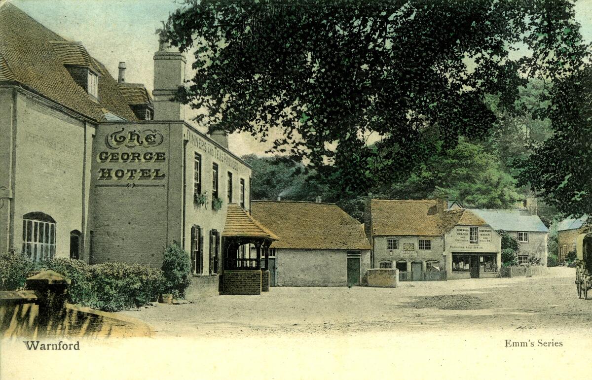 The George Hotel and Homewood Stores. c1910