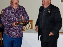 Coalville Town retain The Quorn Mills Trophy. Kev Starkey receives it in memory of his brother-in-law Steve Preston.