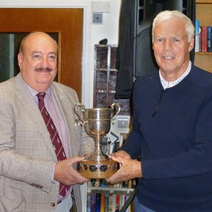 Presentation Evening 2022. Bill Draycott, Mens Handicap winner being presented with his trophy by County Councillor Ken Crofton