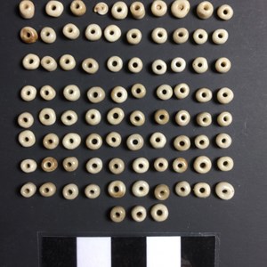 83 Beads probably made from bone or glass!