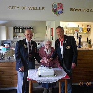Amy Tate cutting our 100th Anniversary cake together with Don Bridges - Burnham-on-Sea Chairman and David Bishop - City of Wells President. The cake was made by our ladies captain Heather Willerton and decorated by former ladies captain Rose Holley.