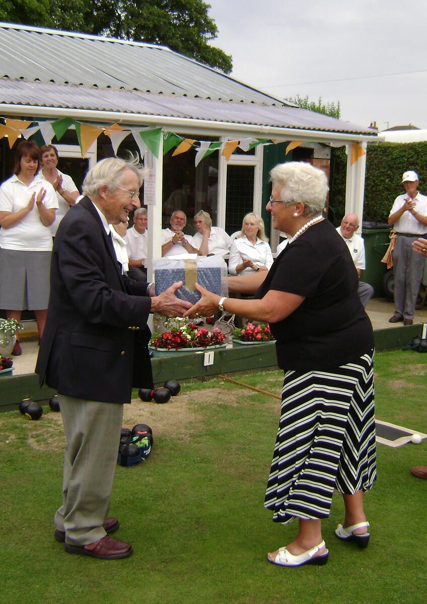 In 2011 we celebrated our 50th Anniversary. Our President, Marion Libell, received a crystal bowl from Ken Drinkel who also opened the Green in 1961.