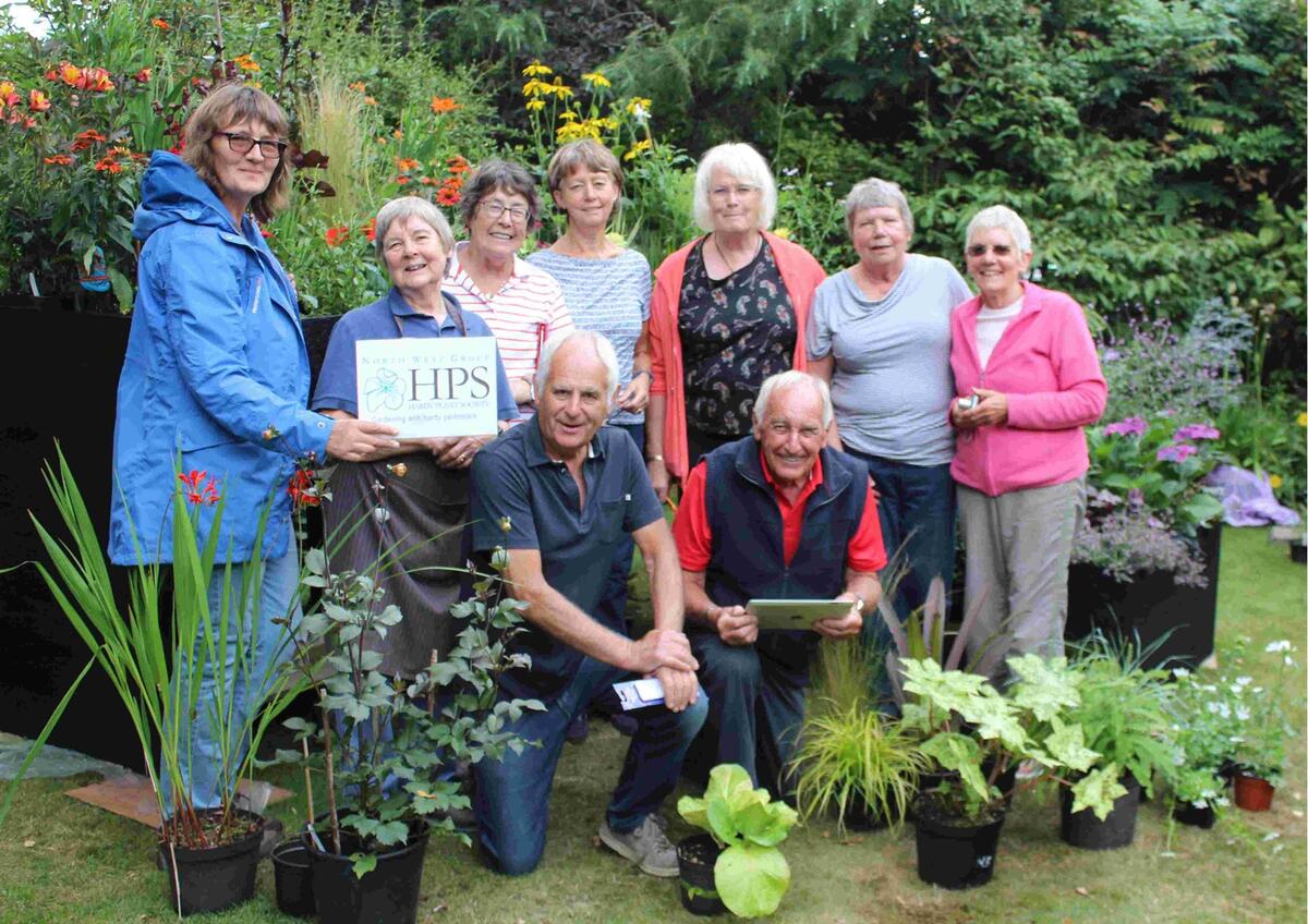 Members working on a display design for Chorley Flower Show