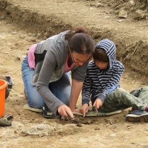 Mum Katharine exploring the archaeology with youngest son Jasper – our youngest volunteer yet!