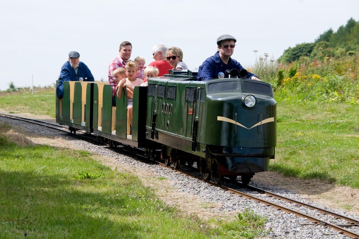 This is the second loco we acquired, also back in 2009. Patricia is a true Diesel Electric Loco. She has a Lister 2 cylinder engine which spins a 110V dc generator which in turn powers the 110V, 12hp traction motor located over the rear bogie. When she arrived at our line she was in a very poor state in a faded maroon livery with her nose badly damaged. But she has been re-wired and had her nose repaired and painted into the current green livery with speed whiskers. A fine loco which has been a long term stalwart of our railway.