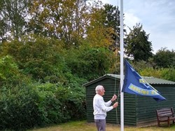 President lowers the flag at the end of the season