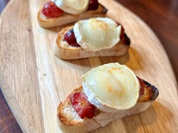 Roasted Grape Crostini with Goat's Cheese on Artisan Bread