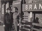 Wiktor Lukaniuk Snr with friendly station porter Brandon 1946.